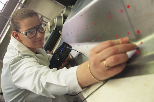 SPF Engineer Kira Woolley checks metal thickness with a micrometer at Doncasters Bramah  in 2000