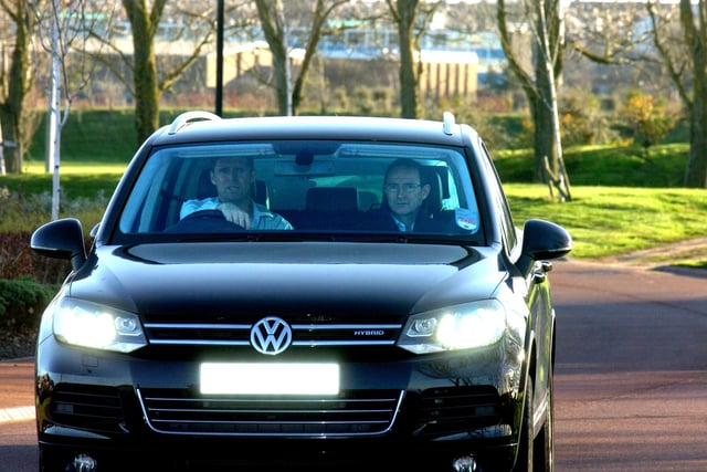 Martin O'Neill being driven away from the Academy of Light by Niall Quinn after he signed a three-year deal to become Sunderland's new manager.