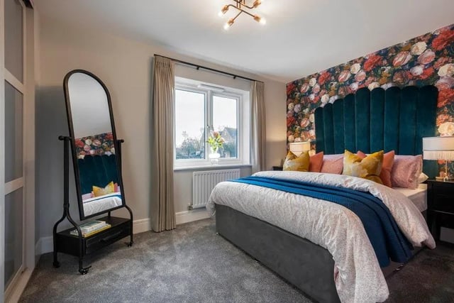 This bright bedroom comes with a shower en-suite.