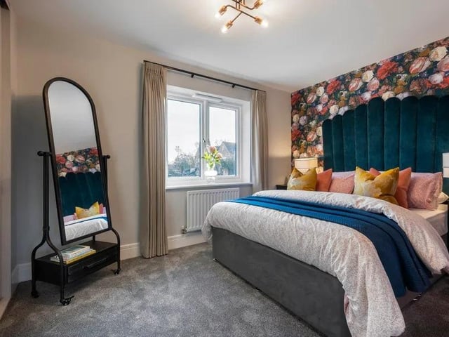 This bright bedroom comes with a shower en-suite.