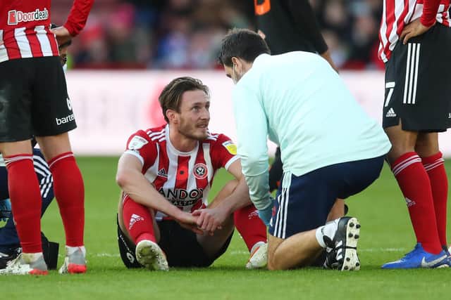 Ben Davies was injured against Blackpool and has been struck by a virus ahead of Sheffield United's trip to Blackburn Rovers: Simon Bellis/ Sportimage
