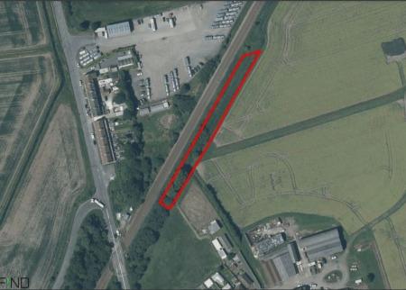 This vacant strip of land, next to a train line, is being auctioned off with no reserve, meaning the bidding will start at £0.