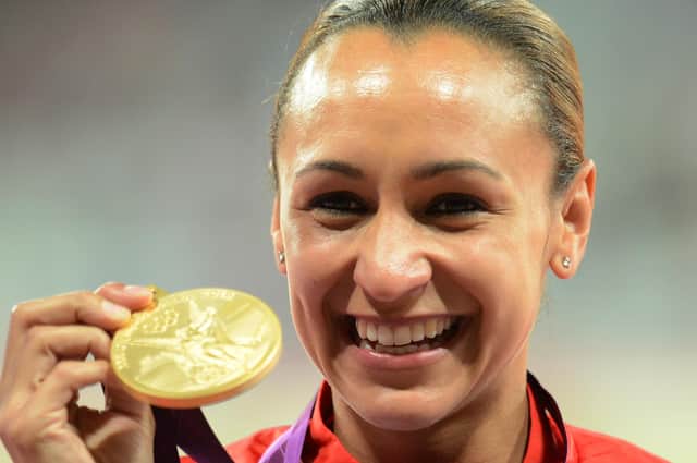 Sheffield's Jessica Ennis celebrates with her gold medal