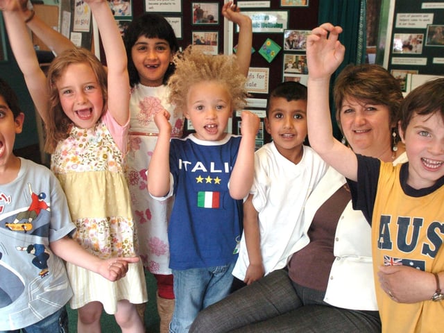 Holt House Primary School headteacher Jane Clay pictured with some of her pupils celebrating an outstanding Ofsted report
