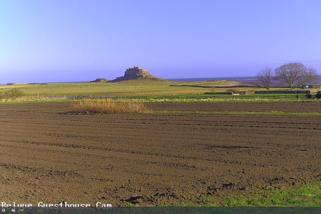 View towards Lindisfarne Castle.

https://holy-island.uk/lindisfarne-castle-webcam-live/