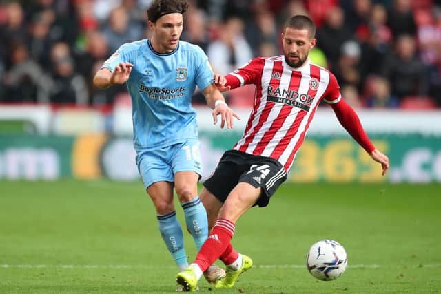 Callum O'Hare of Coventry City is tackled by Conor Hourihane of Sheffield United: Simon Bellis / Sportimage