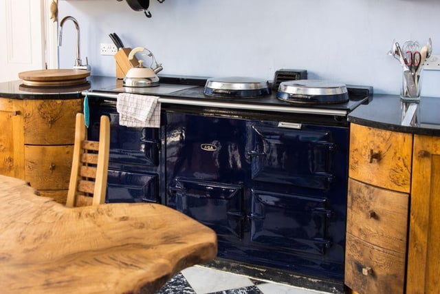 The kitchen includes a five-oven Aga.