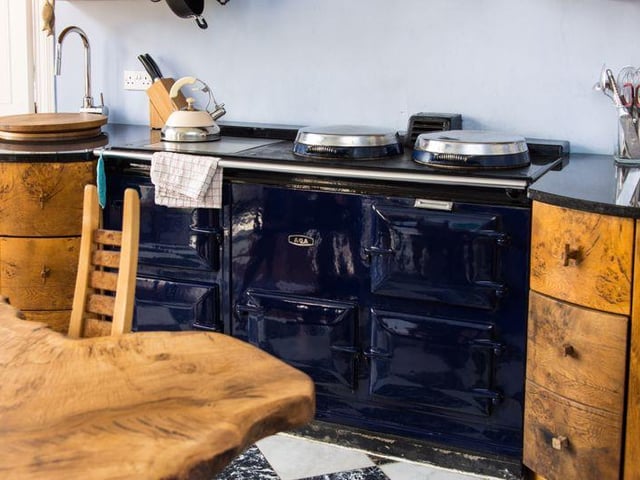 The kitchen includes a five-oven Aga.