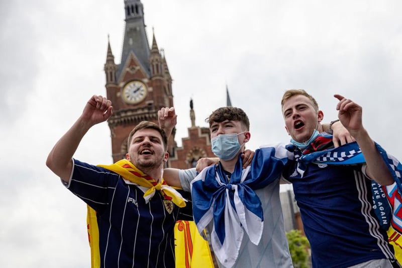 These Covid-conscious chanters were ready to boogie all day long as they showed off their flags outside King's Cross station in London, hours before the match at Wembley.