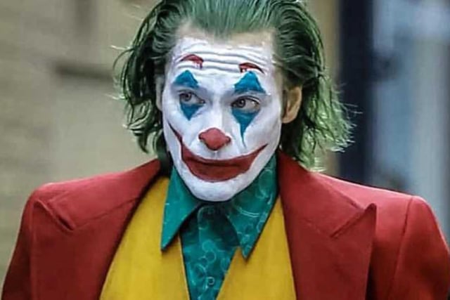 There have been several interpretations of the Joker over the years, so there’s a choice of which look to go for. The most recent depiction by Joaquin Phoenix requires white face paint (or pale foundation mixed with a bit of talcum powder), bright red lips, red eyebrows and a bit of blue eye shadow or face paint around the eyes.