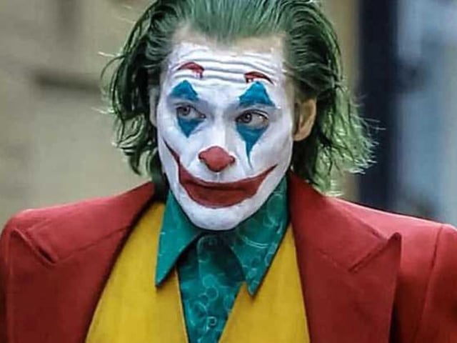 There have been several interpretations of the Joker over the years, so there’s a choice of which look to go for. The most recent depiction by Joaquin Phoenix requires white face paint (or pale foundation mixed with a bit of talcum powder), bright red lips, red eyebrows and a bit of blue eye shadow or face paint around the eyes.