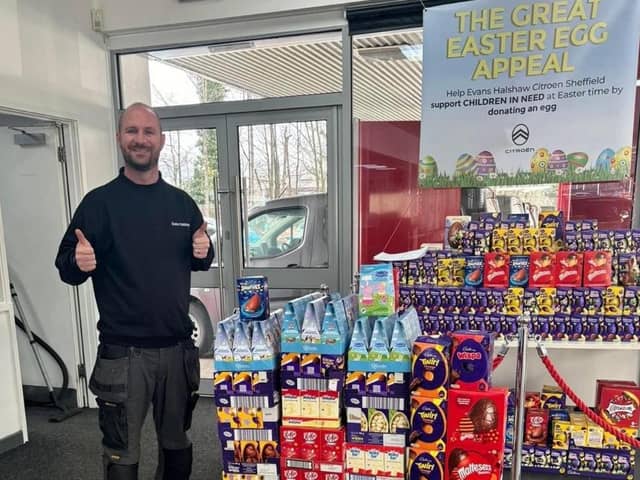 Evans Halshaw colleague, Gavin Clay, with some of the Easter Egg donations at Citroen Sheffield