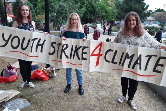 Holly Toombs, Polly Hallam and Molly Cowell at the Youth Strike 4 Climate protest at Devonshire Greem
