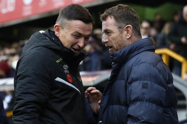 Paul Heckingbottom, the manager of Sheffield United, is greeted by Millwall's Gary Rowett at The Den: Paul Terry/Sportimage
