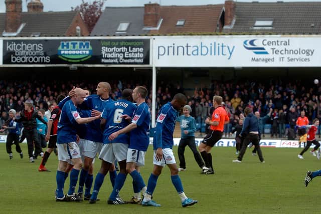 Spireites fans invaded the pitch after Niven's 96th minute winner.