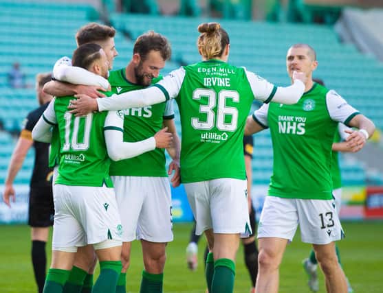 Hibs players celebrate after Martin Boyle's penalty put them 2-0 up on Livingston at Easter Road (Photo by Mark Scates / SNS Group)