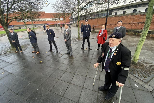 Standard bearers and veterans gather for the Remembrance Sunday parade on November 8.