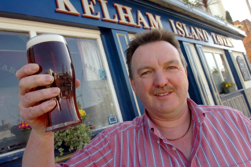 Trevor Wraith celebrates outside the Kelham Island Tavern after his pub won the Campaign for Real Ale Pub of the Year award for Sheffield in April 2007