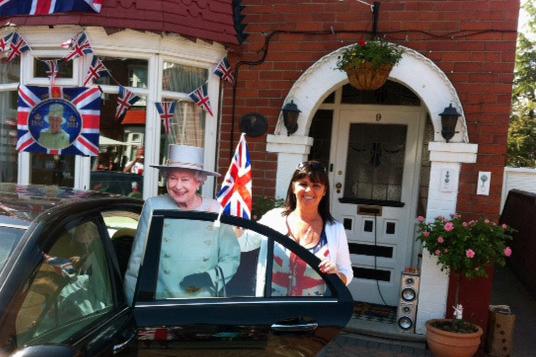 'The Queen' arrives for the Granby Crescent Jubilee street party, with Jackie Salt on hand to greet her in 2012