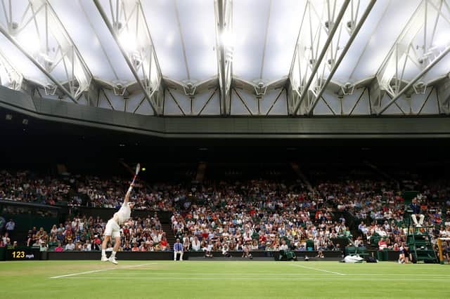 Andy Murray of Great Britain serves during his men's singles third round match against Denis Shapovalov of Canada during Day Five of The Championships - Wimbledon 2021 at All England Lawn Tennis and Croquet Club on July 02, 2021 in London, England. (Photo by Julian Finney/Getty Images) ***BESTPIX***