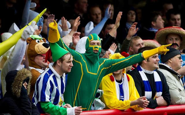 Sheffield Wednesday fans in fancy dress sing prior to the npower League One match between Brentford and Sheffield Wednesday at Griffin Park on April 28, 2012 in London, England. (Photo by Ben Hoskins/Getty Images)