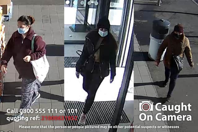 Derbyshire police investigating the theft of a purse have released these images of three women they want to speak to.