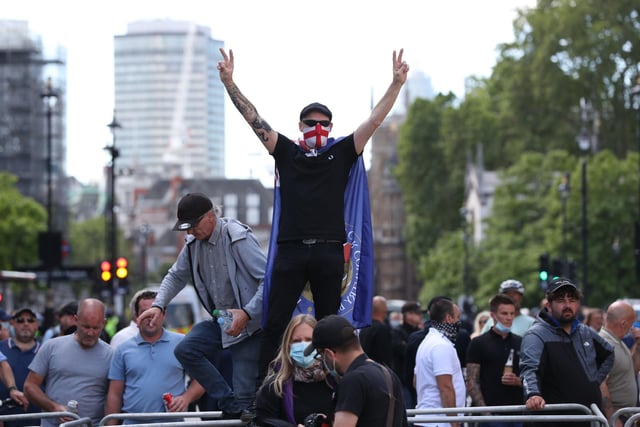 Protesters from the Democratic Football Lads Alliance clash with people taking part in a Black Lives Matter protest in Parliament Square, London. Picture: Jonathan Brady/PA Wire