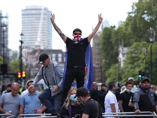 Protesters from the Democratic Football Lads Alliance clash with people taking part in a Black Lives Matter protest in Parliament Square, London. Picture: Jonathan Brady/PA Wire