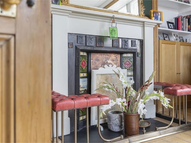 Original fireplace in living room.