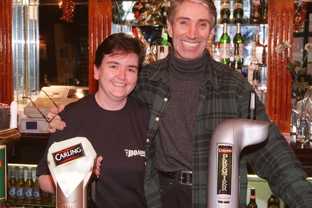 Chris Cunningham, left, and Boardwalk co-founder and musician Herbie Armstrong behind the bar in 1999
