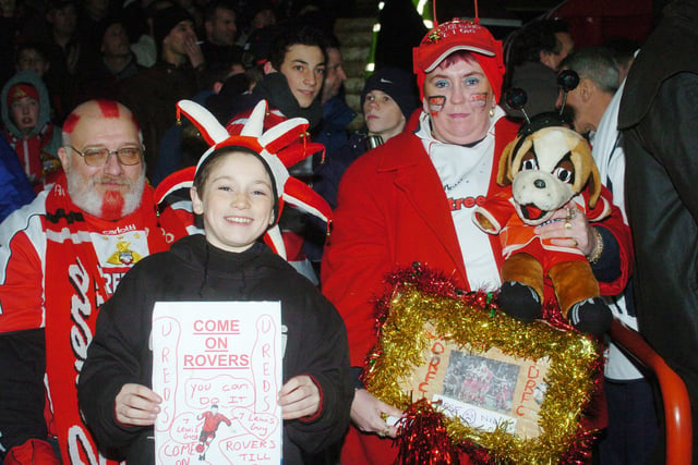 Rovers fans (l-r) Hippo, of Rossington, Dale Hornsby, 11, and mum Sharon, of Bawtry