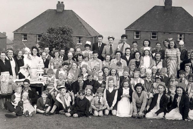 The neighbours turn out for a Coronation street party in Grenoside in 1953