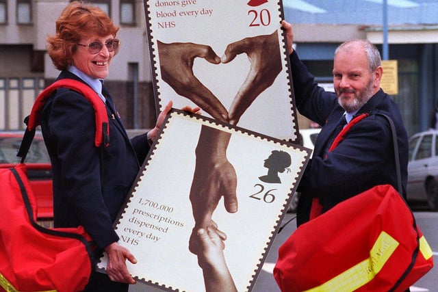 Postie Judith Rosser and Barry Oxborrow showing off the new Royal Mail stamps  in 1998