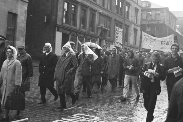 Anti-Vietnam protesters march to at a peace rally in Queen's Park, Glasgow in June 1966