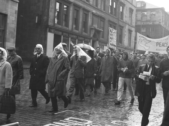 Anti-Vietnam protesters march to at a peace rally in Queen's Park, Glasgow in June 1966