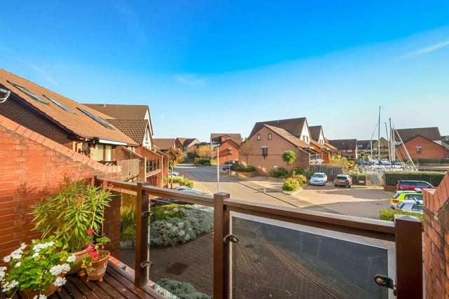 This four bedroom townhouse is on sale for £515,000 in Port Solent. It is listed by Fine and Country.