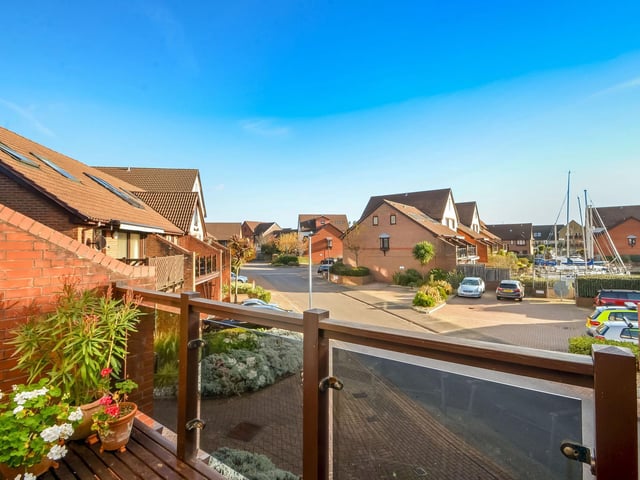 This four bedroom townhouse is on sale for £515,000 in Port Solent. It is listed by Fine and Country.