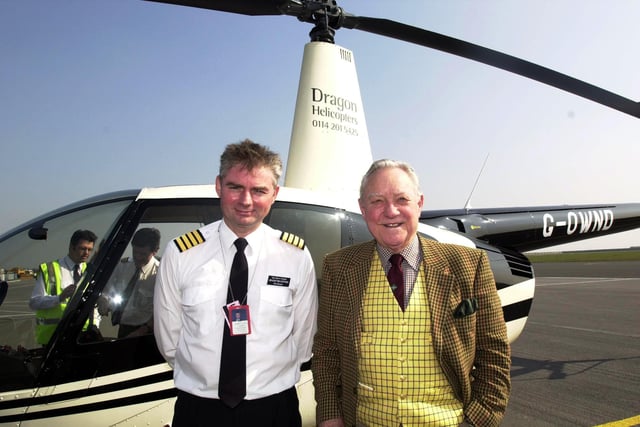 Actor Richard Todd, who starred in the film The Dambusters as celebrated RAF pilot Guy Gibson,  is welcomed by Robert Alexander, managing director of Dragon Helicopters, when he arrived at Sheffield City Airport on his way to Derwent Dam in 2002