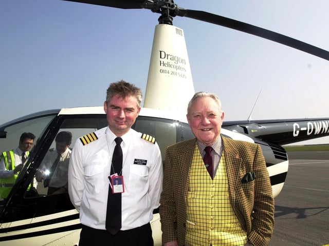 Actor Richard Todd, who starred in the film The Dambusters as celebrated RAF pilot Guy Gibson, is welcomed by Robert Alexander, managing director of Dragon Helicopters, when he arrived at Sheffield City Airport on his way to Derwent Dam in 2002