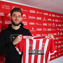 Charlie Goode signs for Sheffield United at the Randox Academy, Sheffield: Simon Bellis/Sportimage