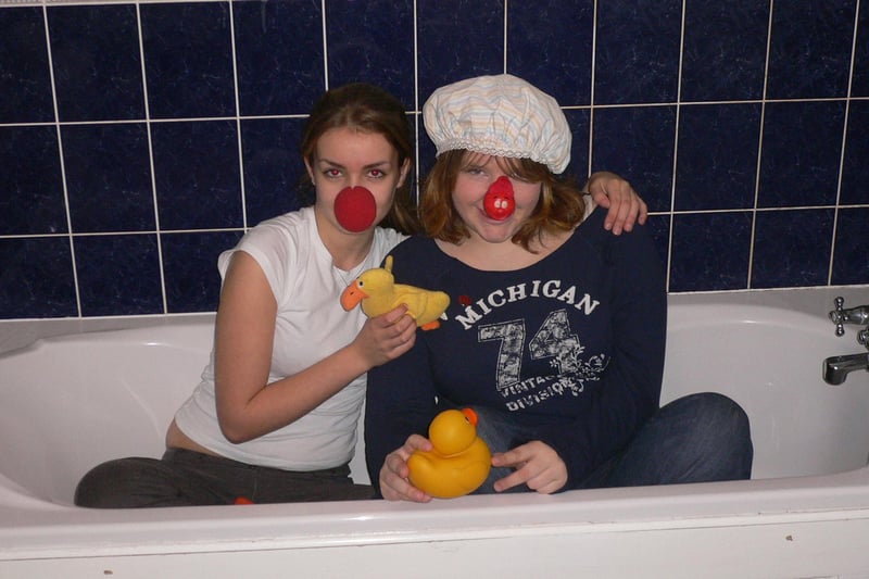 Layla Allen and Kate Lonsdale, of Lady Manners School, Bakewell,  give a preview of bathing in tomatoes in Chesterfield town centre  for Red Nose Day in 2007.