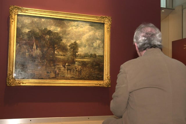 Landscape painter John Constable's work was the focus of an exhibition at the Millennium Gallery in 2003. A guest is pictured looking at a full-scale oil sketch of The Hay Wain.