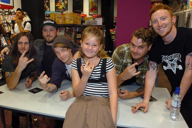 Heavy metal band While She Sleeps, originally from Renishaw just outside the city, pictured here with a young fan, won the best British Newcomers aware at the Kerrang awards in 2012, and have now shared 10th place in our poll. One per cent of our voters rated them as the most Sheffieldish band. Picture: Stuart Hastings, National World