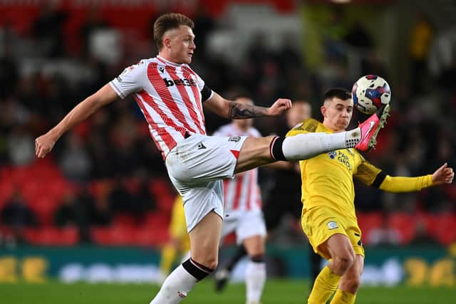 Harry Souttar of Stoke City battles for the ball with Ben Woodburn of Preston during the Sky Bet Championship between Stoke City and Preston North End at Bet365 Stadium on January 02, 2023 in Stoke on Trent, England. (Photo by Gareth Copley/Getty Images)