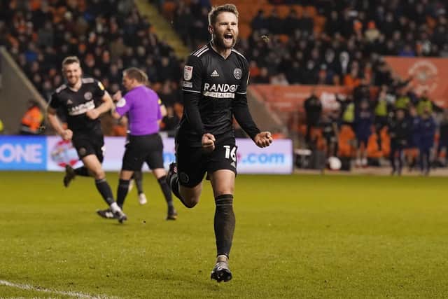Sheffield United's Oliver Norwood celebrates scoring before it is ruled out for offside against Blackpool at Bloomfield Road. Andrew Yates / Sportimage