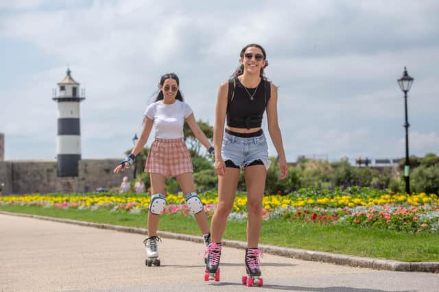 Sisters Josie and Jenny Lake skating outside D-Day story, Southsea. Picture: Habibur Rahman