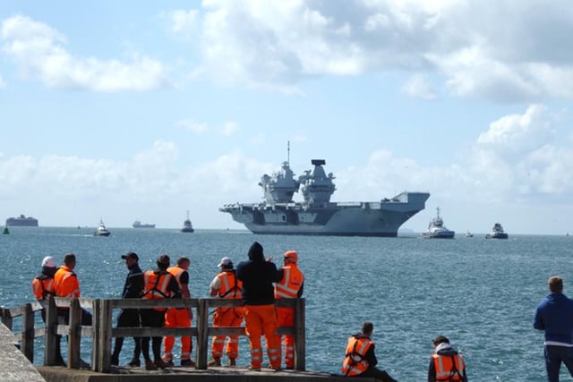 People watching HMS Queen Elizabeth arriving back into Portsmouth Picture: Karina Hill