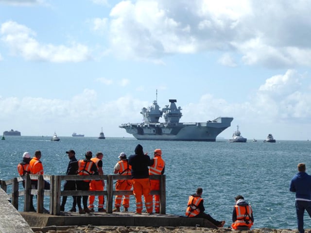 People watching HMS Queen Elizabeth arriving back into Portsmouth Picture: Karina Hill