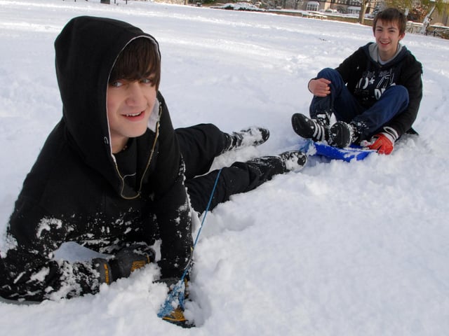 Warsop teenagers, 15-year-olds Ryan Arrowsmith and Adam Ludgate are pictured enjoying the snow at the Carr's in Warsop in early December