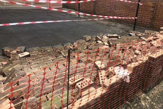 A man has been arrested after damage was caused to a number of walls on Sheffield Road, Woodhouse